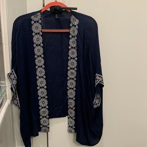Navy kimono wrap with switched pattern.